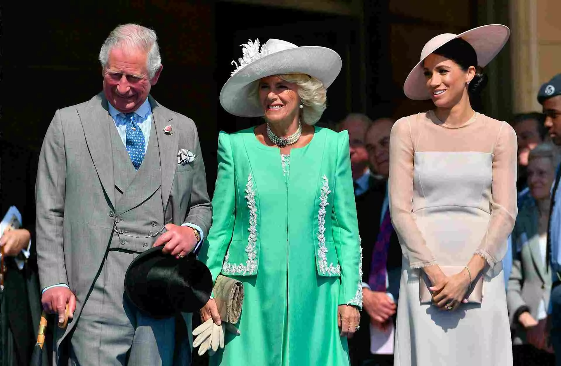 Carlos III, Camilla Parker-Bowles y Meghan Markle